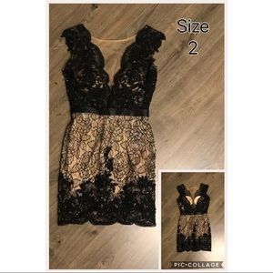 Black and nude lace cocktail dress